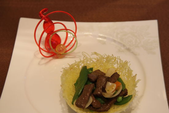 雀巢爆羊柳。 花惠生 供圖