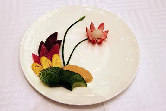 迎賓冷盤“洋花蘿卜”。 花惠生 供圖