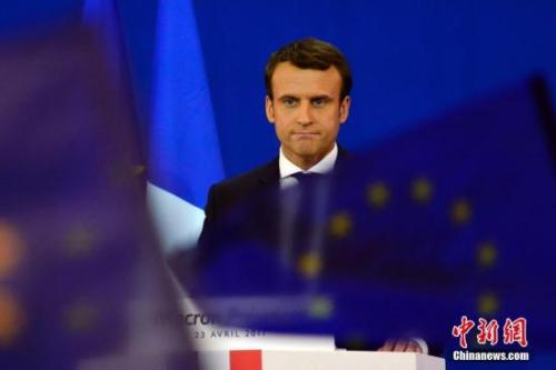 圖為馬克龍在慶祝集會上。中新社記者 龍劍武 攝
